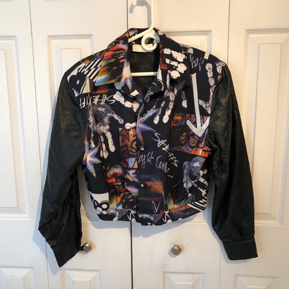 Abstract print jacket with leather sleeves